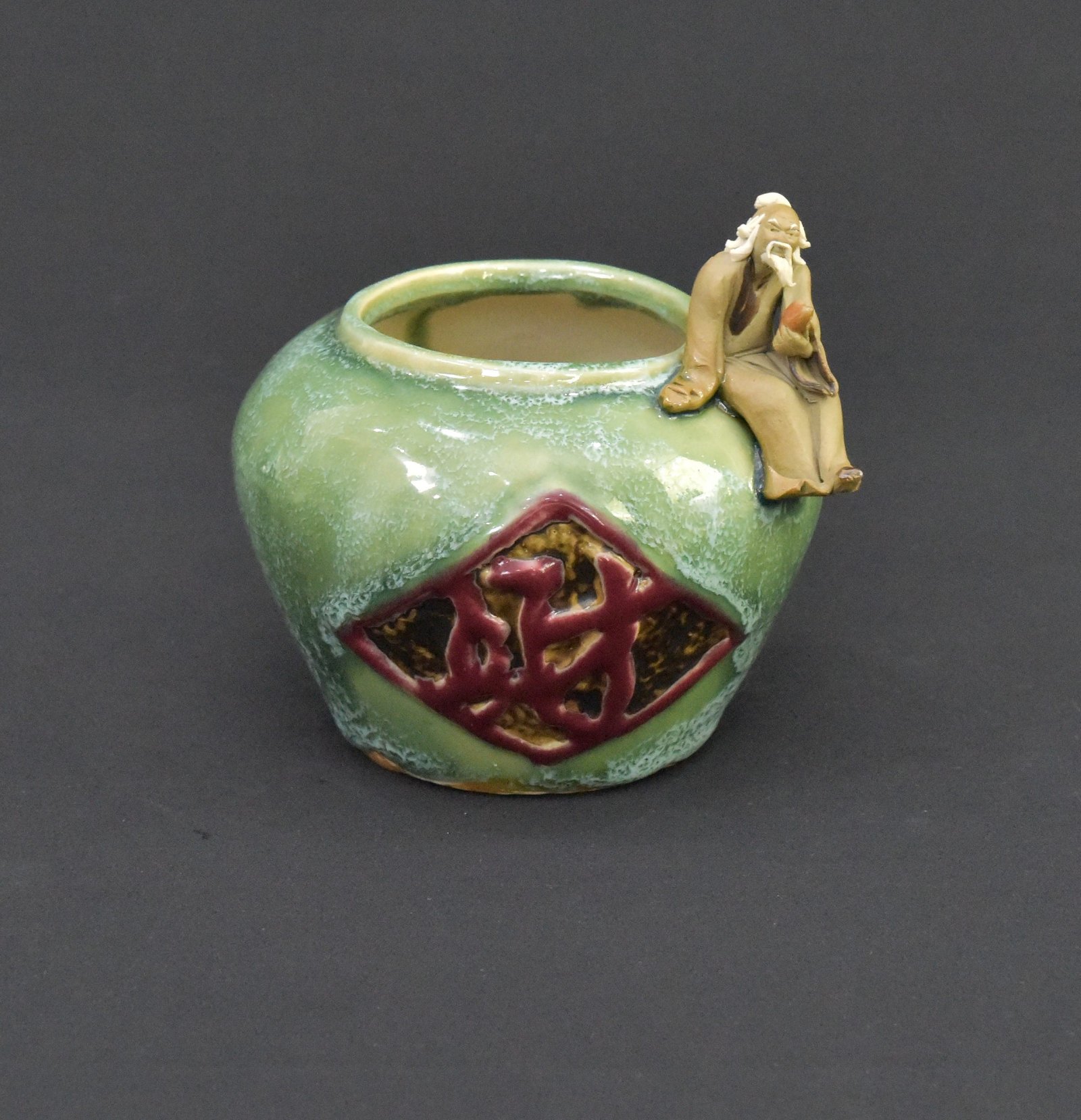 Ceramic Fortune Wine Jar with Sage Figurine – Green Glazed Decoration – 105mm Height x 110mm Width x 110mm Depth – 465g